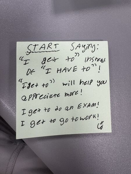 Handwritten sticky note with words of encouragement